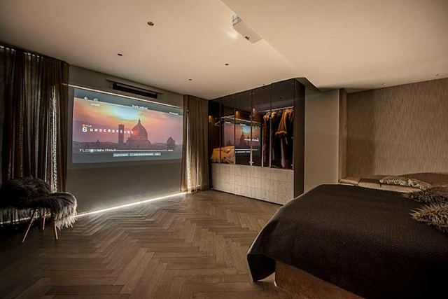 Bedroom with home cinema projector – Star Design Solutions