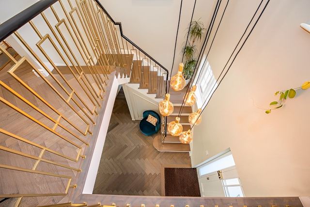 Feature staircase with pendant lighting – Star Design Solutions project