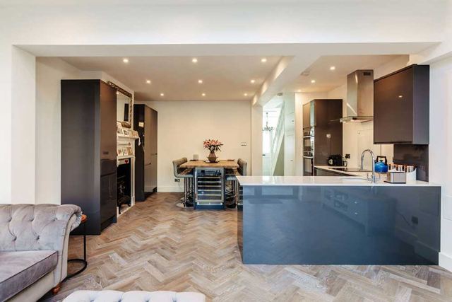 Open-plan kitchen with grey island – Star Design Solutions