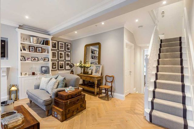 Period living room opening onto hallway staircase – Star Design Solutions